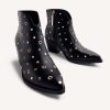 GIOSEPPO STUDS AND EYELETS ANIMAL PRINTBOY BOOTS MUSKEGON