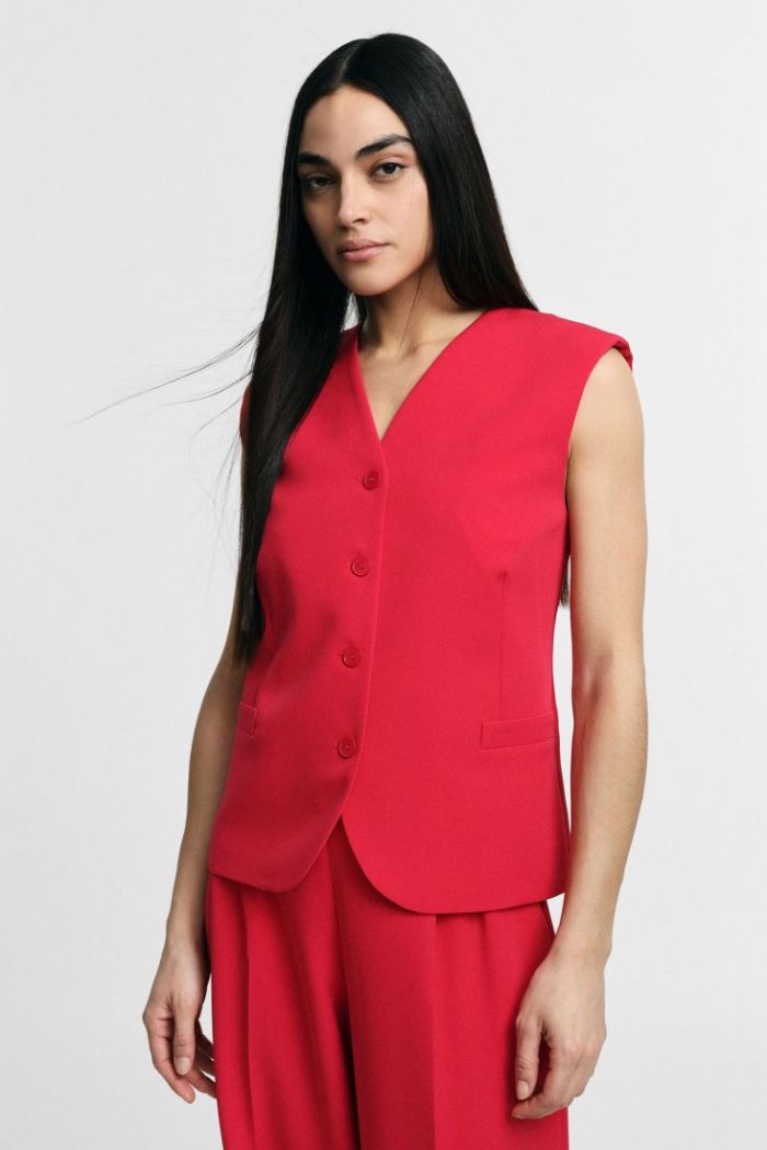 PLEASE VEST WITH V-NECK AND WELT POCKETS