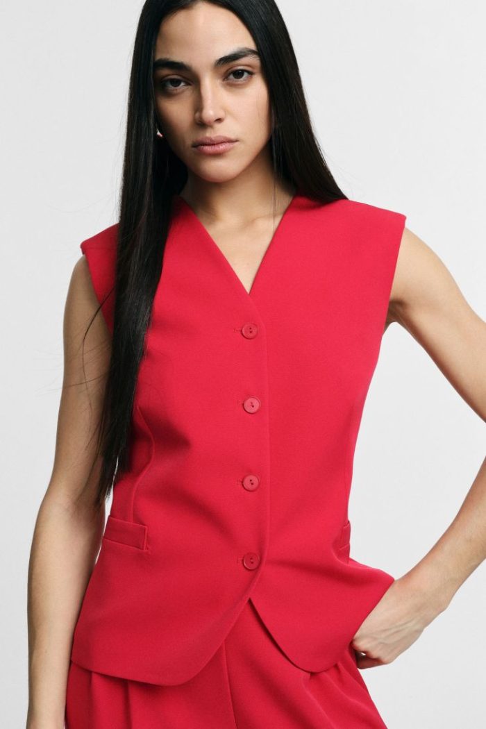 PLEASE VEST WITH V-NECK AND WELT POCKETS