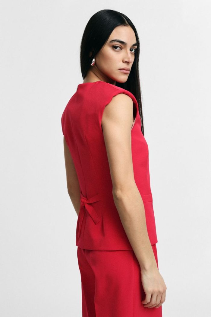 PLEASE VEST WITH V-NECK AND WELT POCKETS